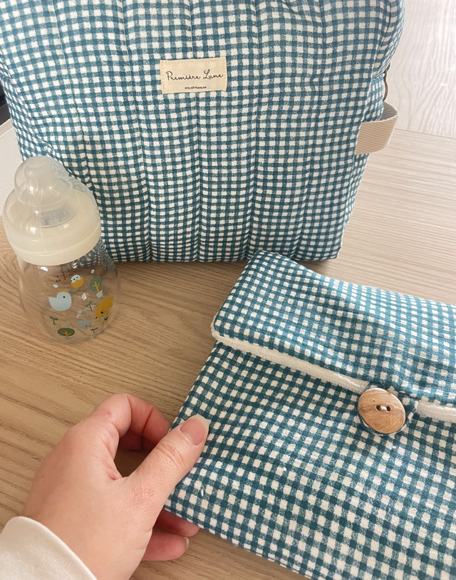 Ensemble trousse et tapis à langer James