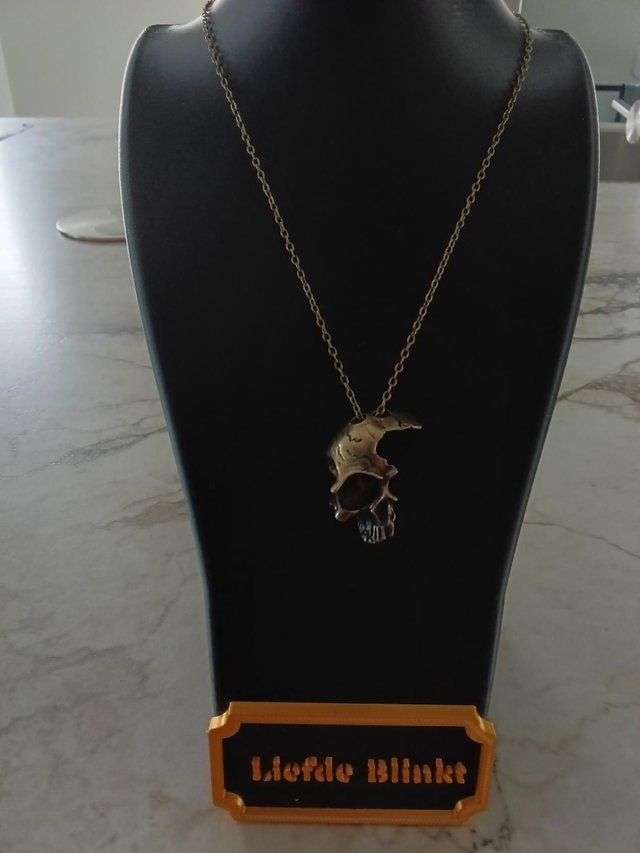 Ketting goud halve skull