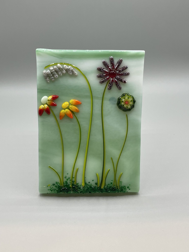 Freestanding fused glass floral scene 