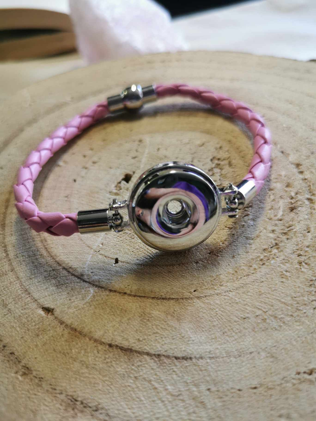Bracelet rose clair tressage simple 