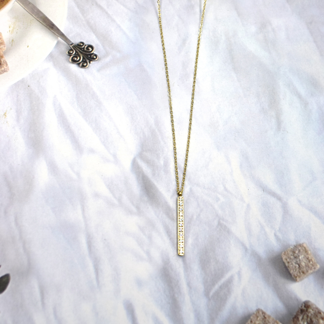 Collier barre pendante strass 