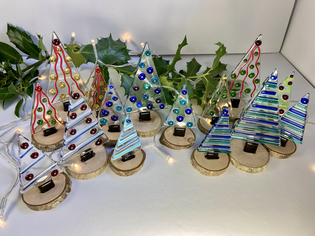 Christmas trees on wooden base