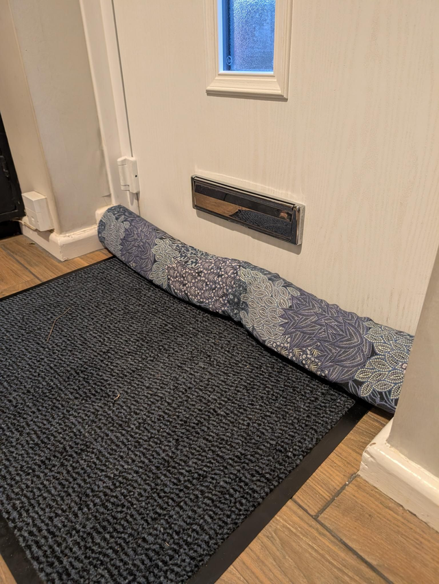 Blue leaf draft excluder