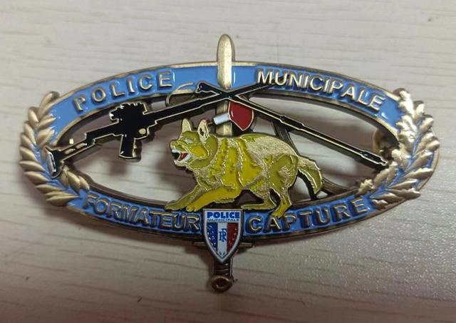 Insigne métallique Capture Animale 