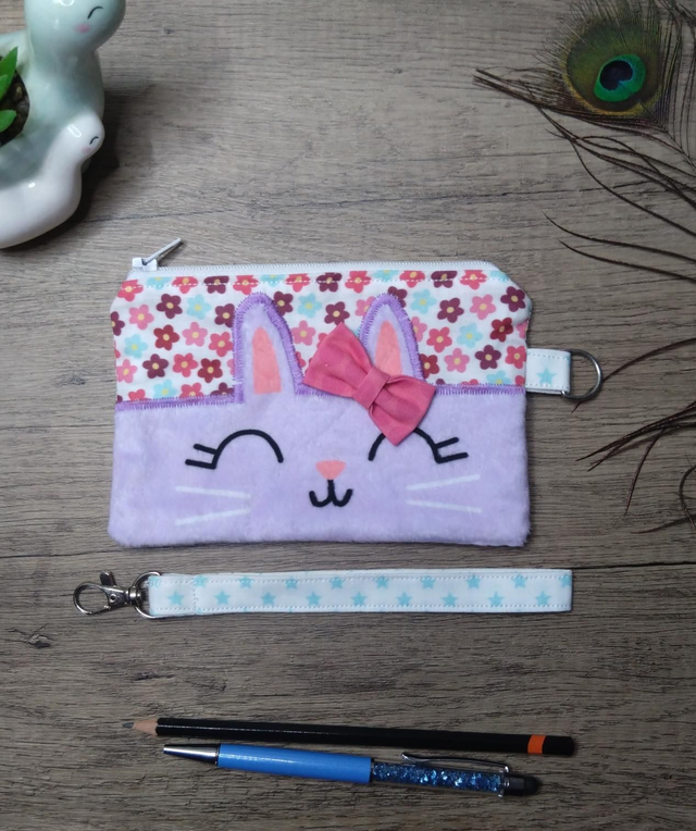 Lilac rabbit zip purse with wrist strap 
