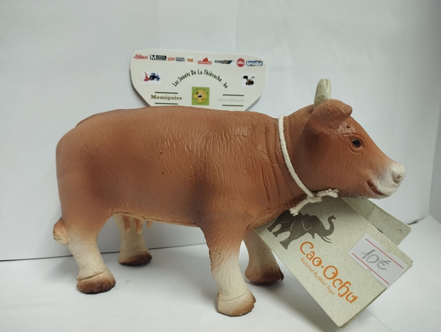 602  Jouet en caoutchouc naturel vache brune NaN Jouet en caoutchouc naturel vache brune