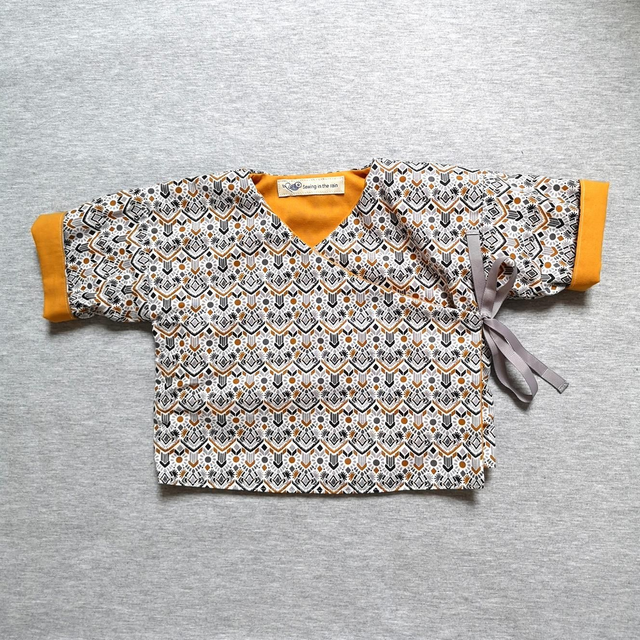 Cache-coeur taille 6 mois