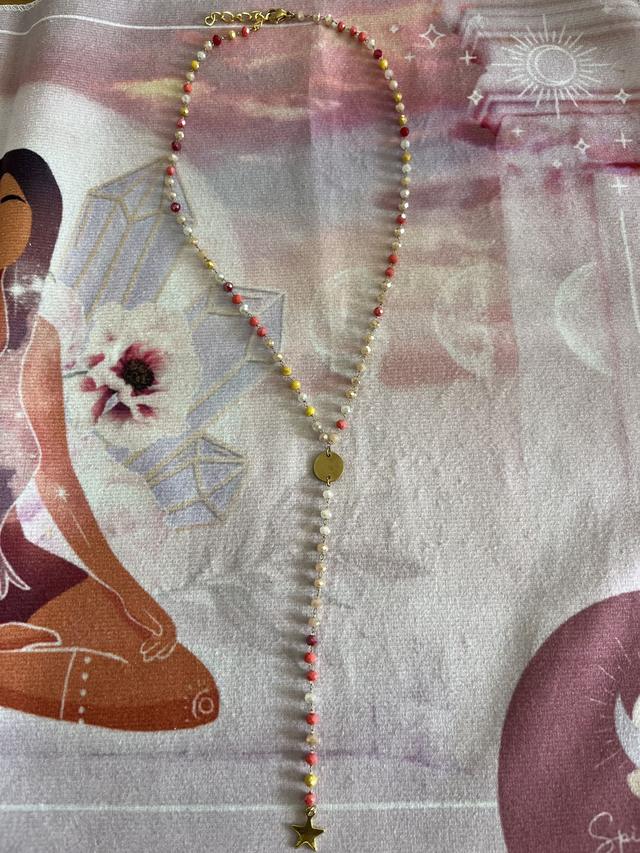 Collier perlé plongeant