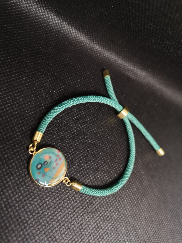 Bracelet doré cordon vert
