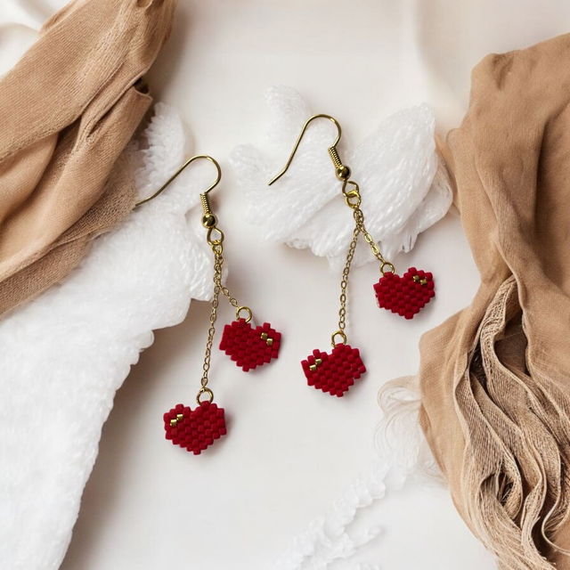 Boucles d&#039;oreilles duo de coeurs rouge