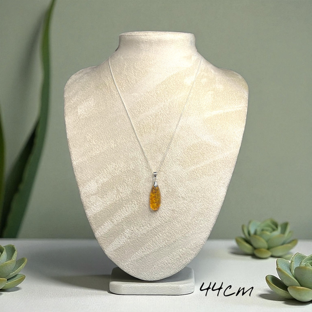 Amber and sterling silver pendant necklace