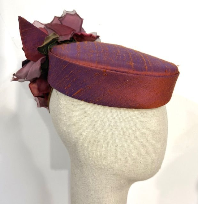 Rust silk pillbox with roses