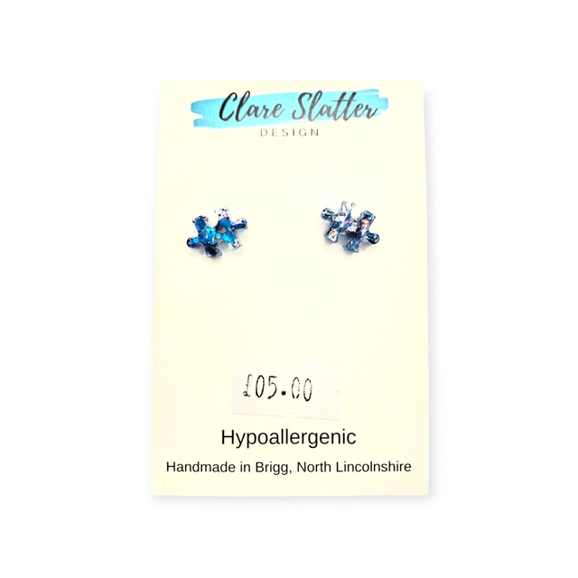 Jigsaw puzzle piece studs