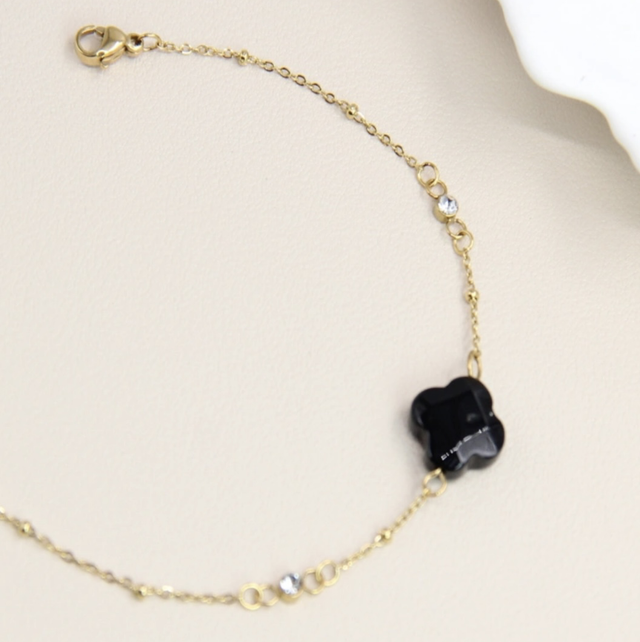Bracelet doré trèfle noir
