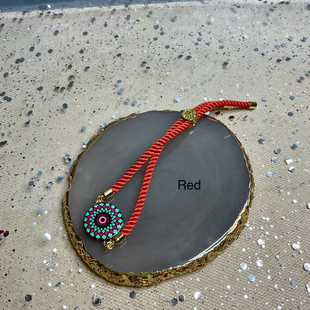 Handmade adjustable cord bracelets.