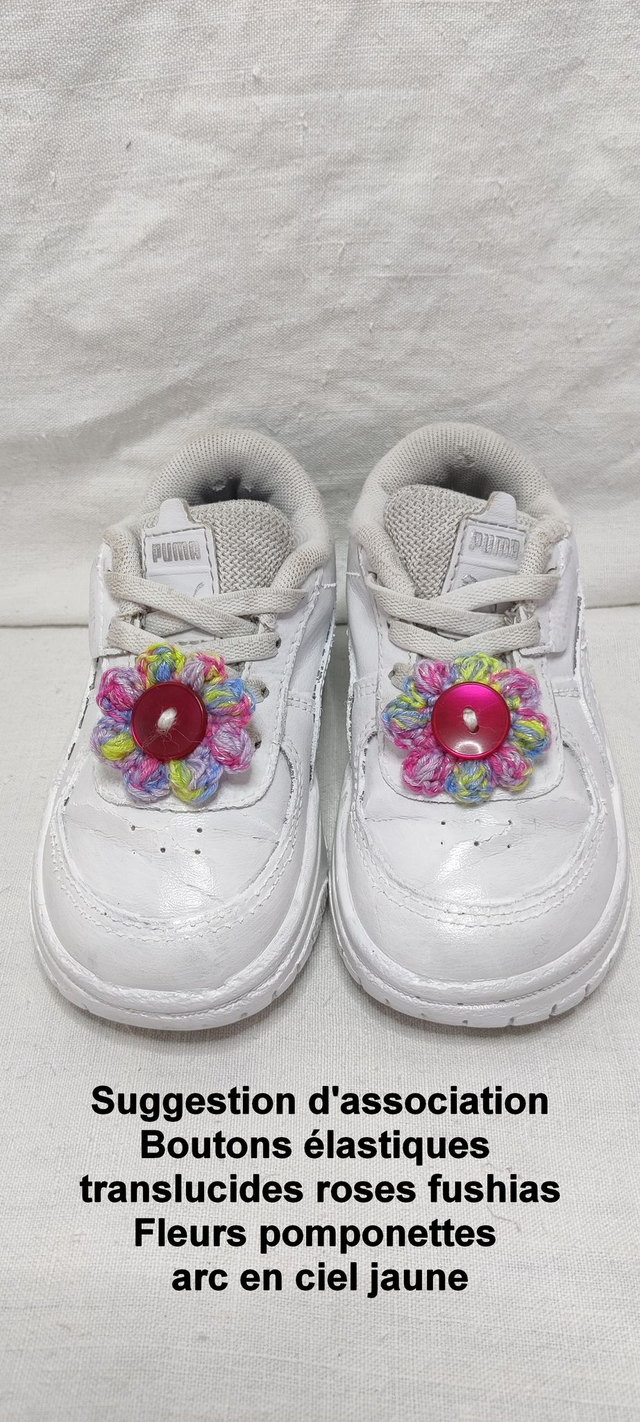 Boutons élastiques translucides fushias