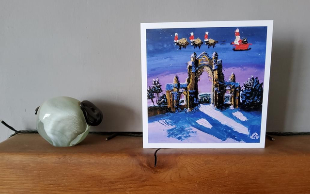 Father Christmas and his Swaledale sheep over Guisborough Priory. 6x6" Christmas card.