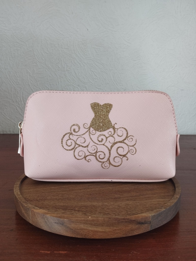 Trousse à maquillage robe dorée