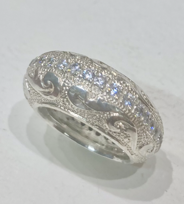 Floreal domed silver ring with cubic zirconia