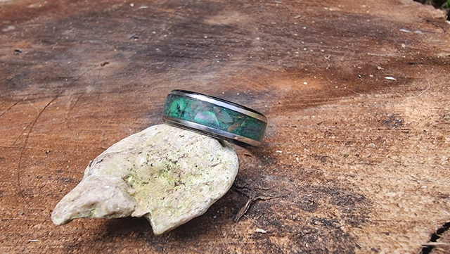 Silver or stainless ring inlaid with either Aberlone shell or Crushed opal