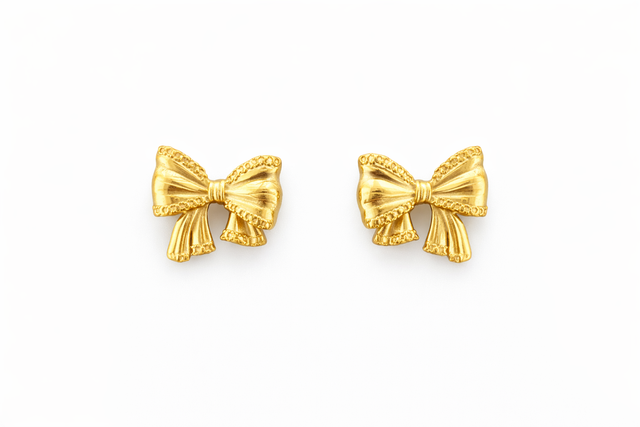 Pendientes acero dorado lazos 