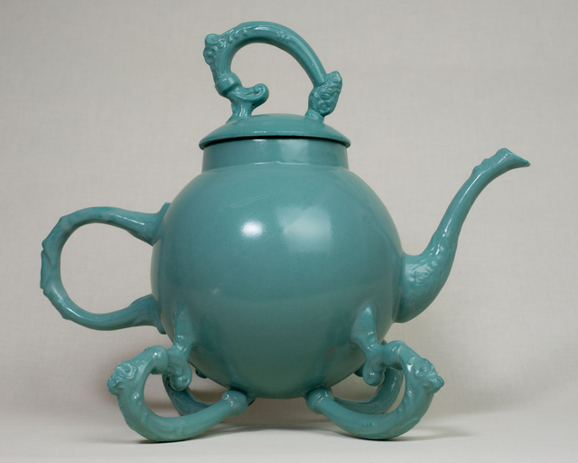 Green Teapot with four handle legs 