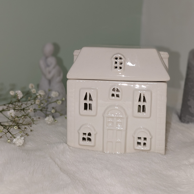 White ceramic house wax burner
