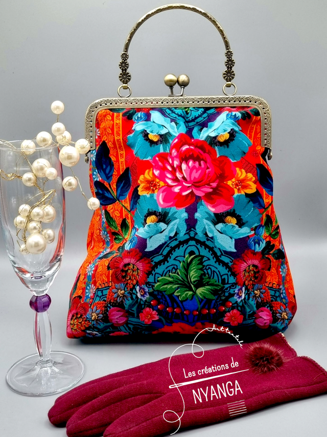 Sac élégant avec anse et fermoir métal vintage 