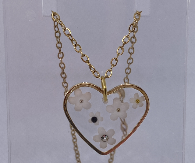 Gold necklace with acrylic flowers 