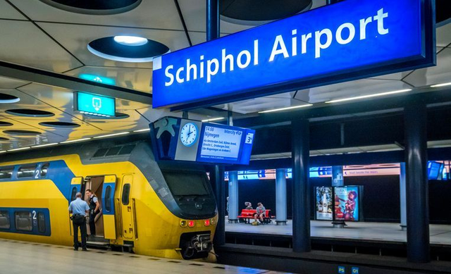 AMS Airport meet up service and travel to AMS Centraal Station by train.  Off-peak hours. (outside rush hour) (TOUR ADD ON)