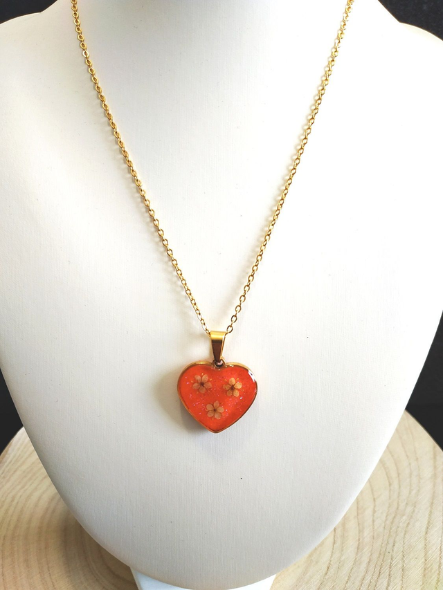 Collier cœur fleuri rouge doré