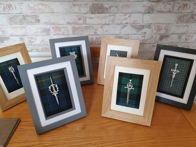 Framed kilt pins