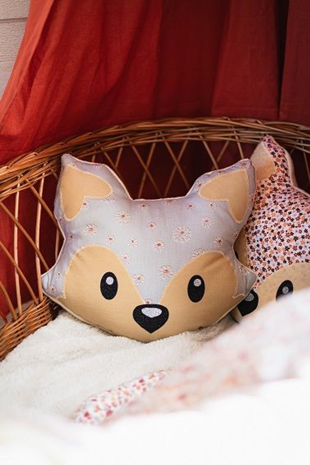 Coussin range pyjama Gris