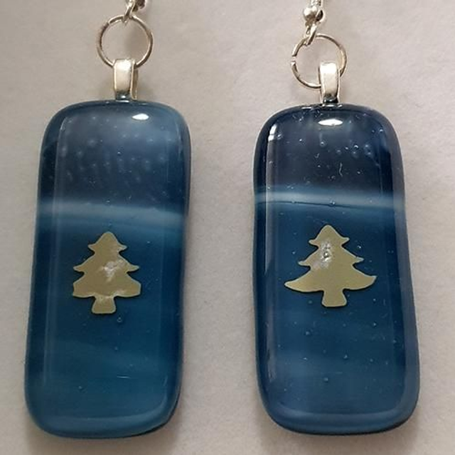 Mid blue whispy glass with small silver tree design dangly earrings e38a