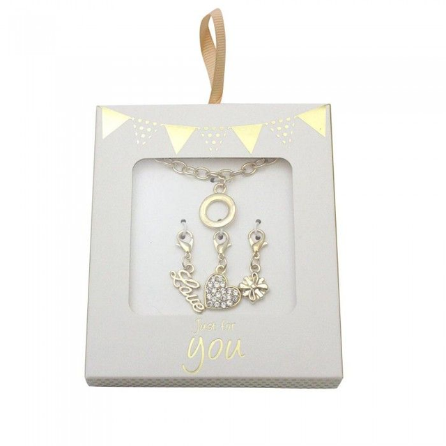 Boxed charm bracelet set in silver or gold tone