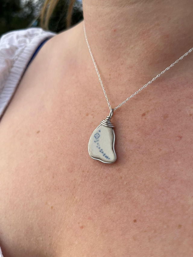 Blue floral pottery pendant