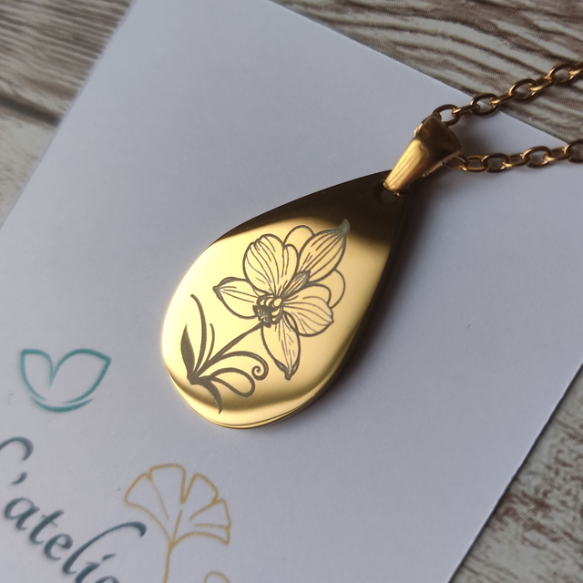 Collier Orchidée goutte acier doré