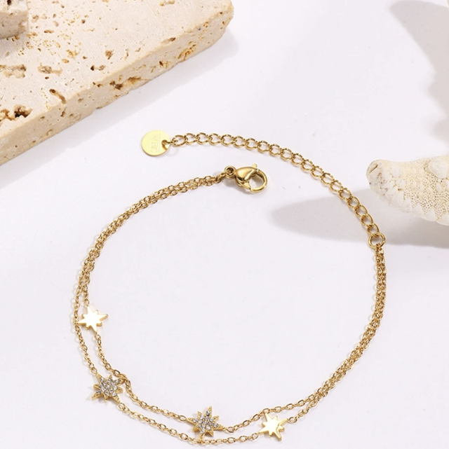 Bracelet chaîne double étoiles doré