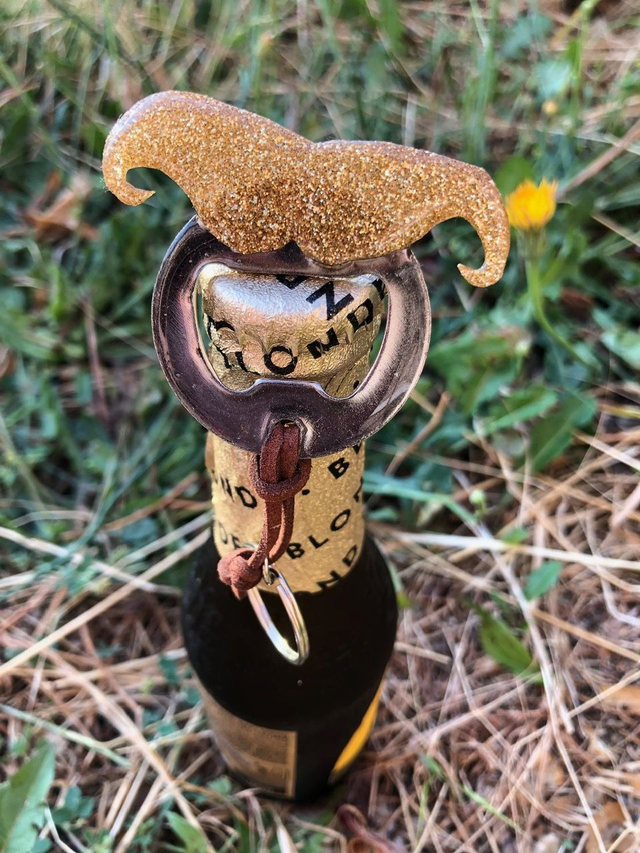 Porte clés décapsuleur