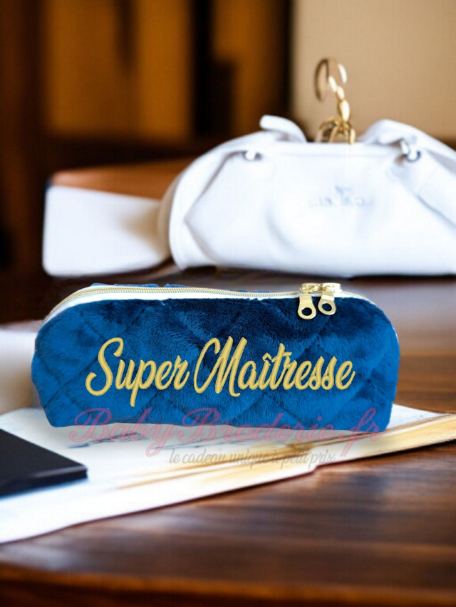 Trousse d'école Bleu marine et motifs feuillage sur fond bleu