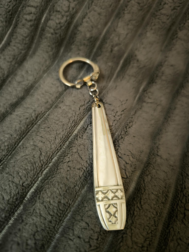 Porte-clé en métal argenté