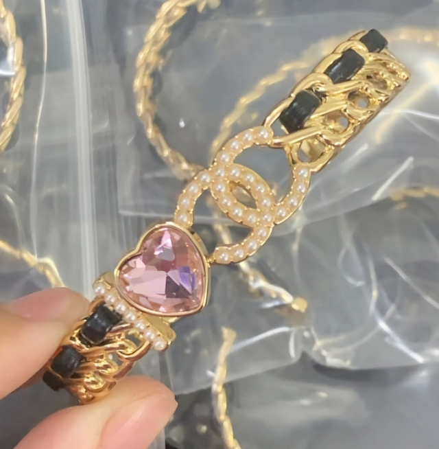 Bracelets CH doré avec bonde noir et 🧡 