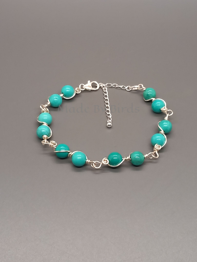 Sterling Silver And Turquoise Bead Bracelet Decorated With Hand Crafted Wire Swirls 