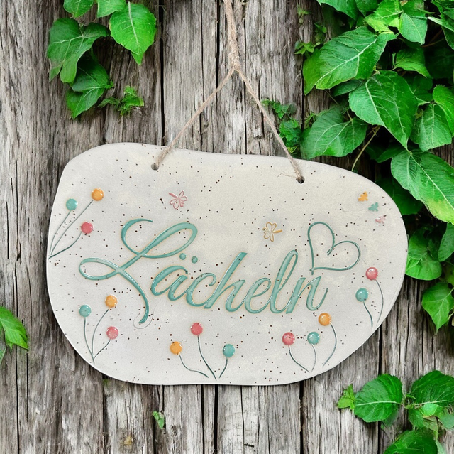 Gartenschild „Lächeln“