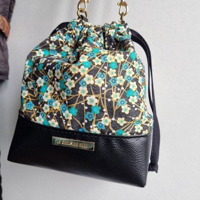 Baluchon "Haru" vert & simili cuir noir