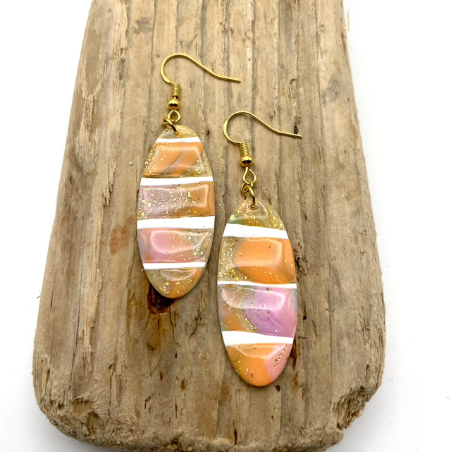 Stretched oval dangles