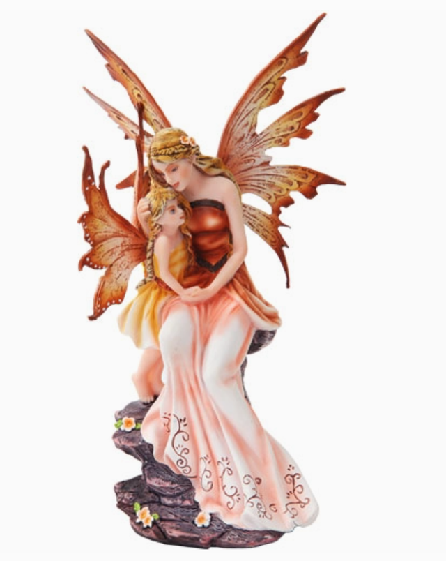 Fée assise avec son enfant