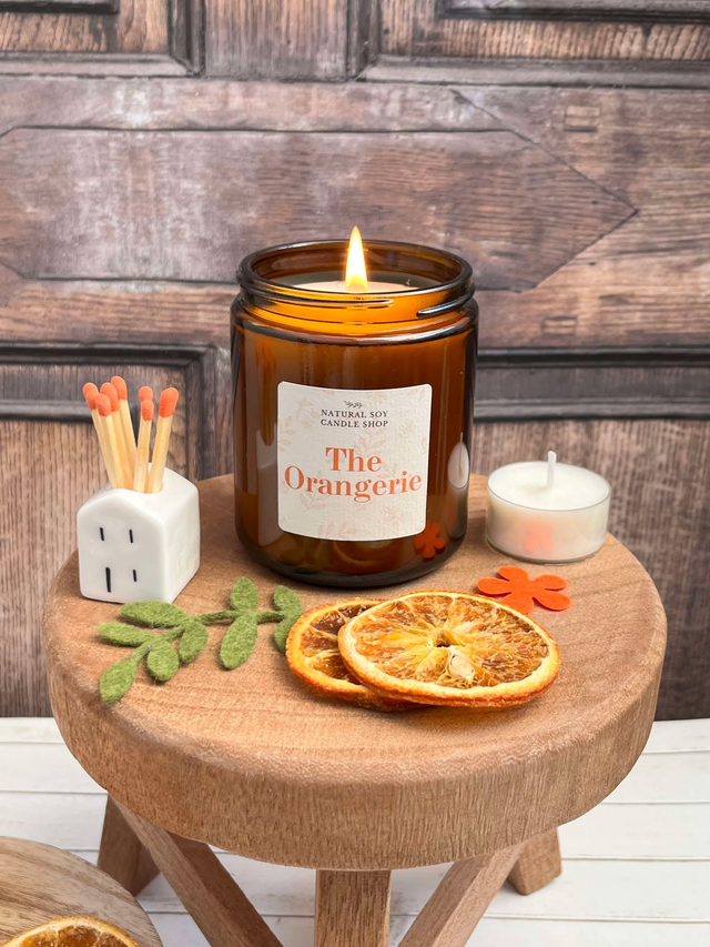 The Orangerie Soy Candle in Amber Glass Jar