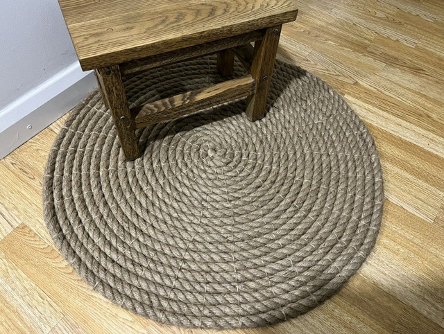Round handmade jute rope rug.