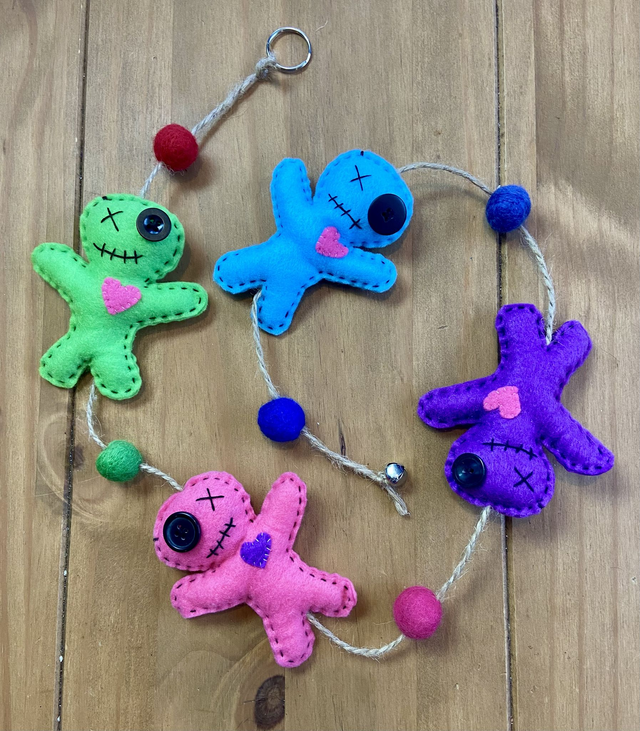 Hanging voodoo doll decoration.
